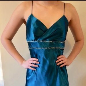 Elegant deep teal satin dress